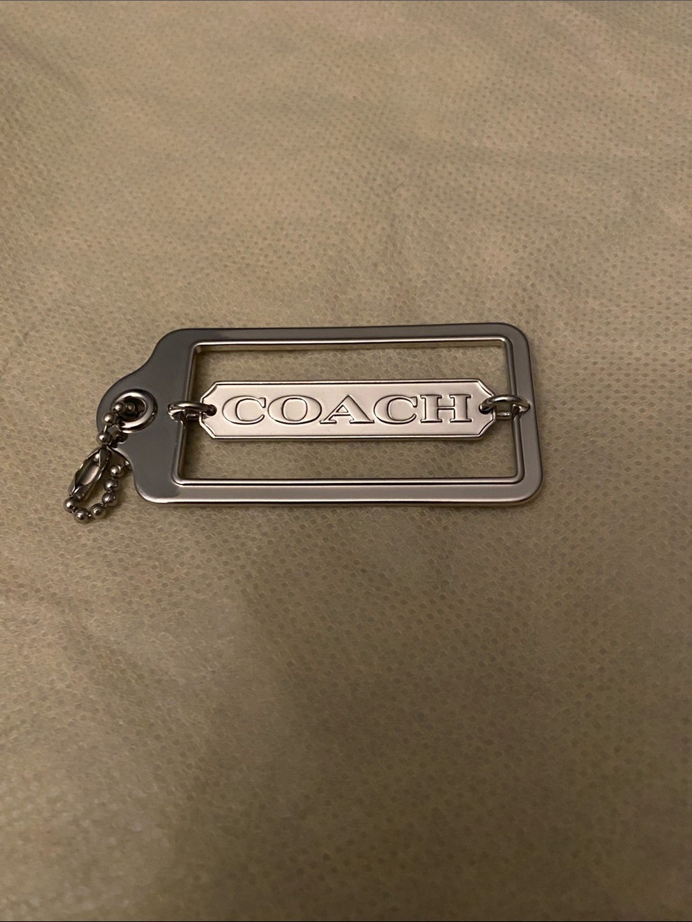 Coach Silver-tone Rectangular Logo Hang Tag